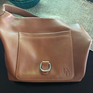 A beautiful Dooney & Bourke tan leather bag!